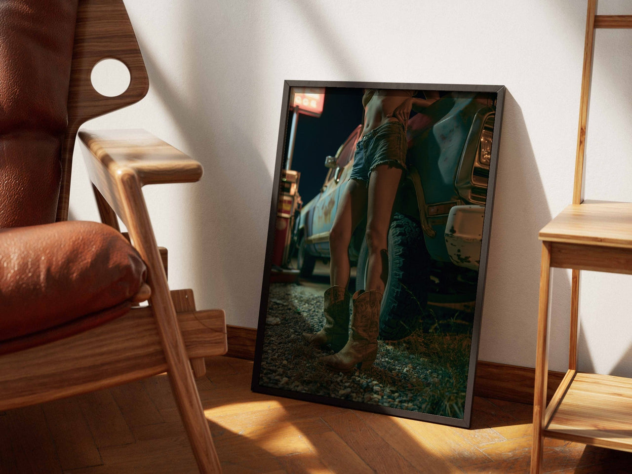 Night Stop framed art beside a leather chair